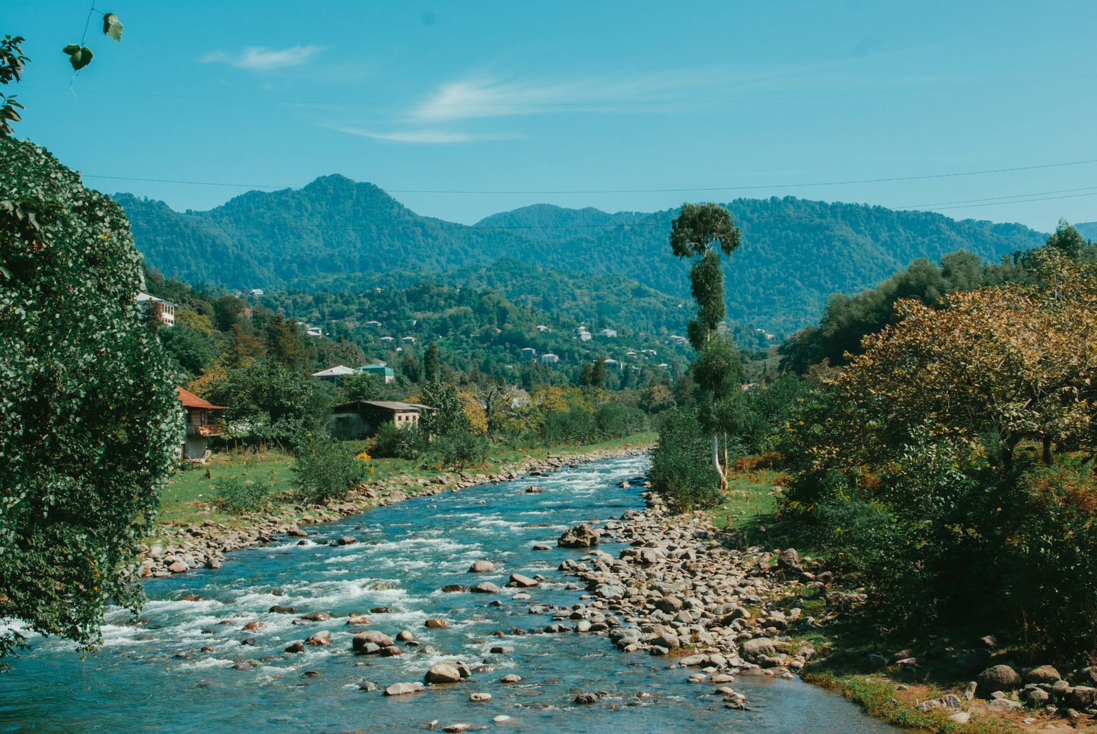 The tranquil Murti river in the Dooars region of North Bengal - Siliguri Cab Rental
