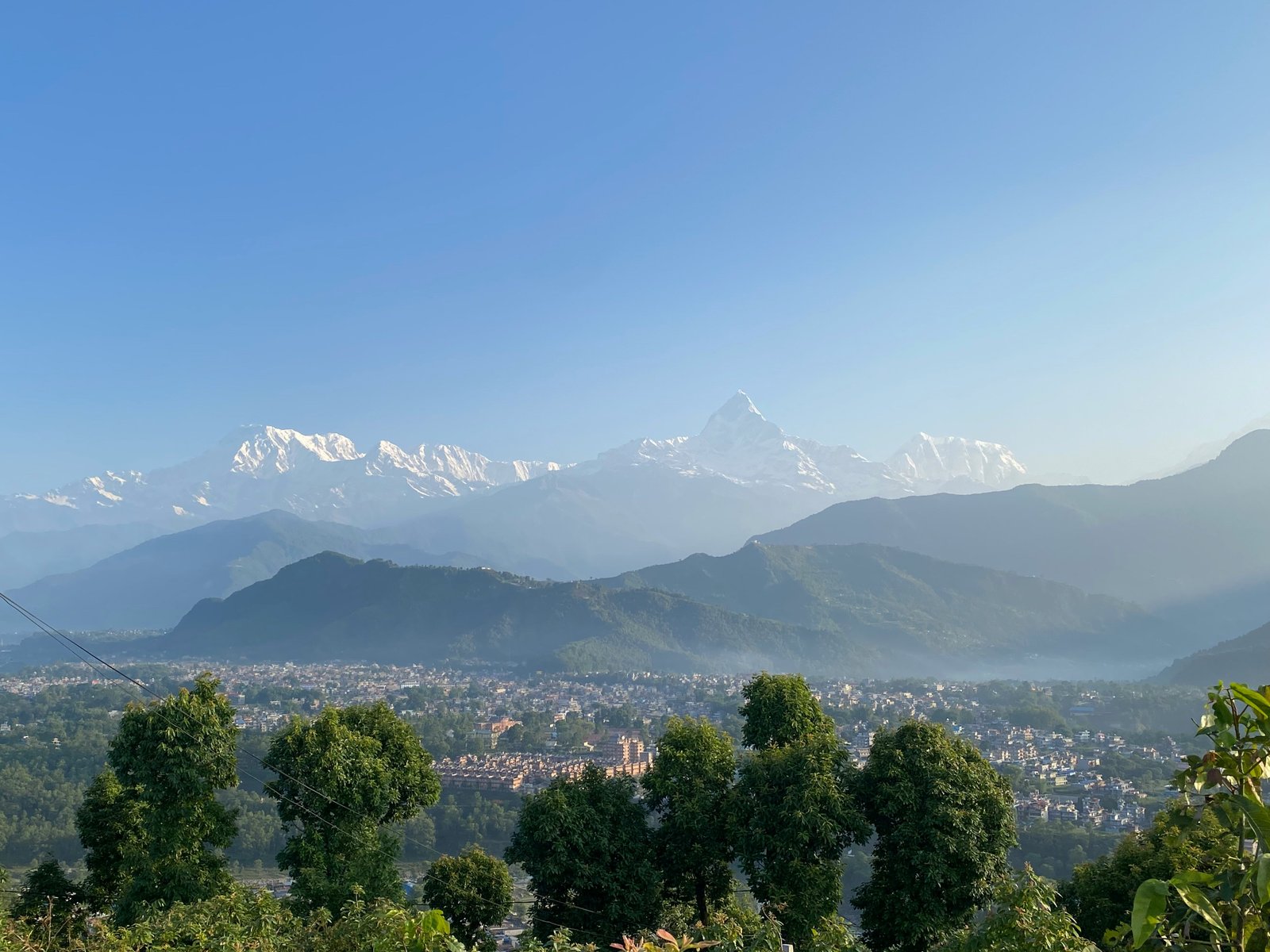 Golden sunrise over Annapurna mountain range from Sarangkot Pokhara Nepal